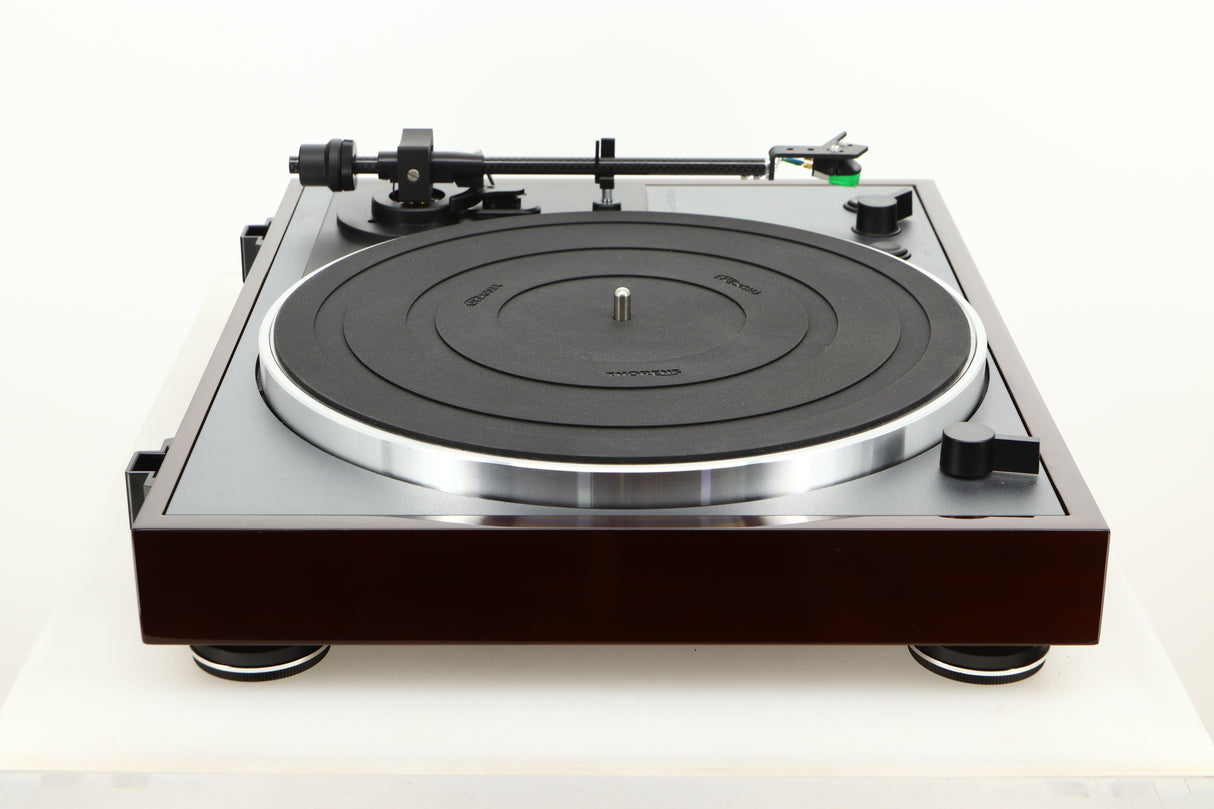 Side view of a used Thorens TD-102A Turntable in Walnut finish