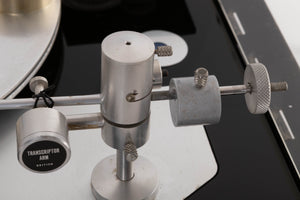 Close up view of a used Transcriptor Hydraulic Reference Turntable with Fluid Tonearm showing some tarnishing on the tonearm 