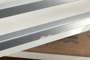 Close up of a used TTW Turntable Wall Mount in a silver finish showing scratch