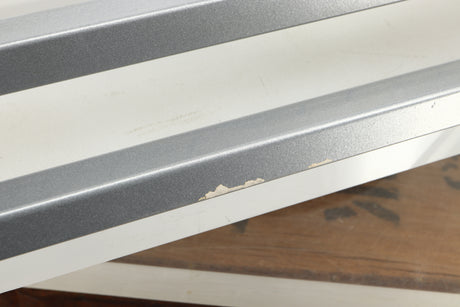 Close up of a used TTW Turntable Wall Mount in a silver finish showing scratch
