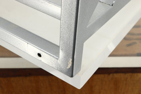 Close up of a used TTW Turntable Wall Mount in a silver finish showing scratch