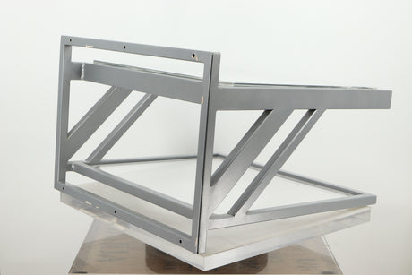 Rear left corner of a used TTW Turntable Wall Mount in a silver finish