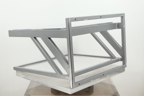 Rear right corner of a used TTW Turntable Wall Mount in a silver finish