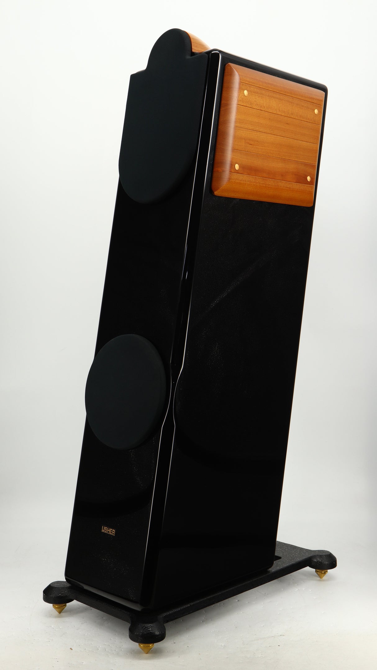 Front right corner of a used Usher CP-6381 Floorstanding Speakers in a gloss black finish