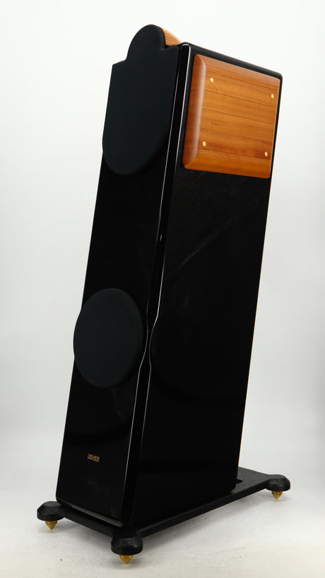 Front right corner of a used Usher CP-6381 Floorstanding Speakers in a gloss black finish