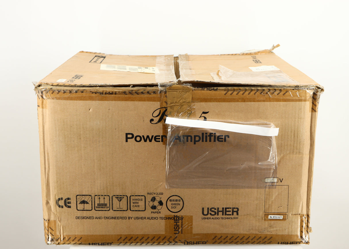 Box for a used Usher R1.5 Power Amplifier in a silver finish