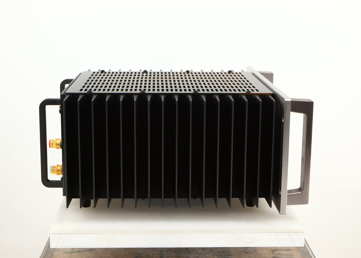 Left side view of a used Usher R1.5 Power Amplifier in a silver finish
