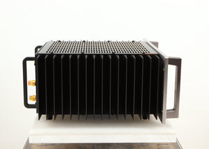 Left side view of a used Usher R1.5 Power Amplifier in a silver finish
