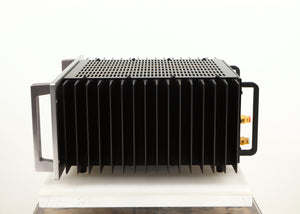 Right side view of a used Usher R1.5 Power Amplifier in a silver finish