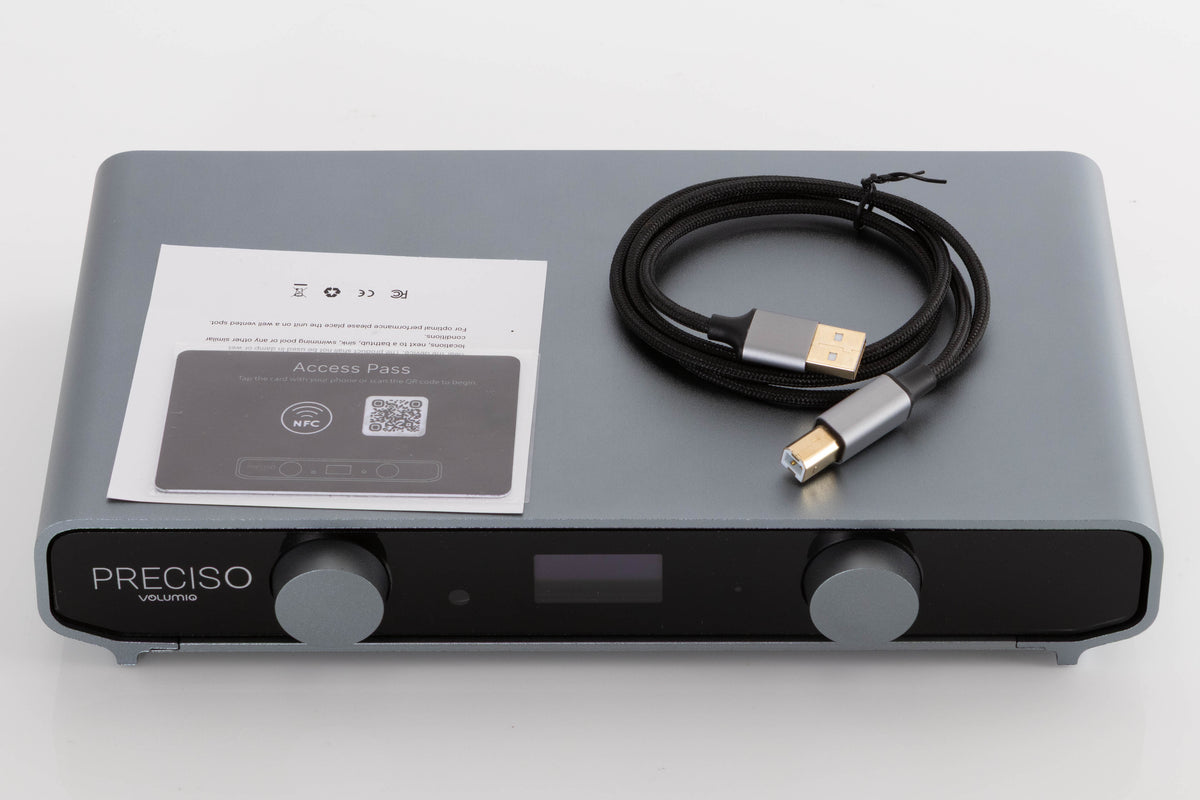 Top of a used Volumio Preciso Digital Analogue Converter in a Silver finish showing Access Pass and USB Cable