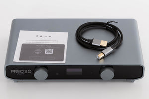 Top of a used Volumio Preciso Digital Analogue Converter in a Silver finish showing Access Pass and USB Cable