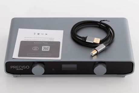 Top of a used Volumio Preciso Digital Analogue Converter in a Silver finish showing Access Pass and USB Cable