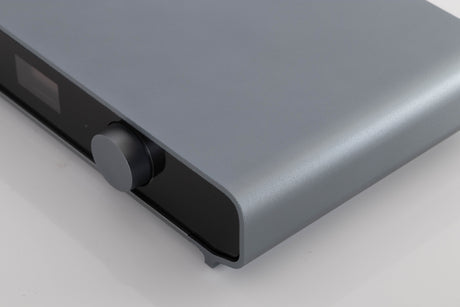 Front right corner of a used Volumio Preciso Digital Analogue Converter in a Silver finish