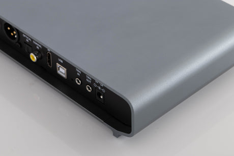 Rear left corner of a used Volumio Preciso Digital Analogue Converter in a Silver finish