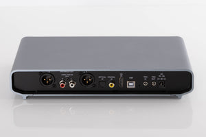 Rear view of a used Volumio Preciso Digital Analogue Converter in a Silver finish showing XLR Output, Phono Outputs, Optical Input, HDMI Input, Coaxial Input, USB Input and Power Input