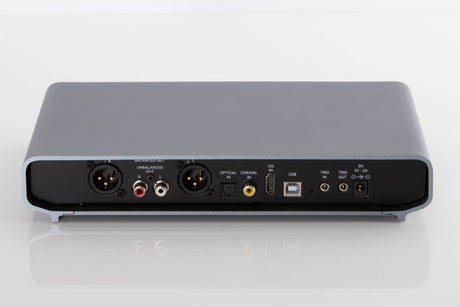 Rear view of a used Volumio Preciso Digital Analogue Converter in a Silver finish showing XLR Output, Phono Outputs, Optical Input, HDMI Input, Coaxial Input, USB Input and Power Input
