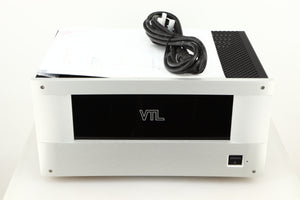 Top of a used VTL ST85 Power Amplifier in a silver finish showing Mains Cable and Manual