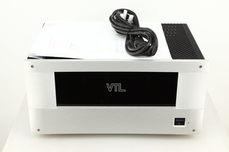 Top of a used VTL ST85 Power Amplifier in a silver finish showing Mains Cable and Manual