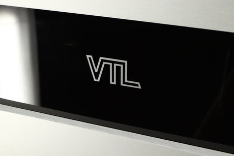 Close up of a used VTL ST85 Power Amplifier in a silver finish showing logo on fascia
