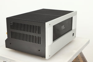 Front left corner of a used VTL ST85 Power Amplifier in a silver finish 