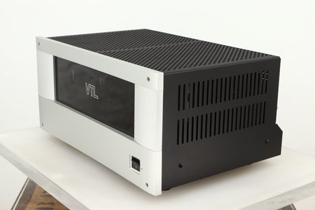 Front right corner of a used VTL ST85 Power Amplifier in a silver finish 