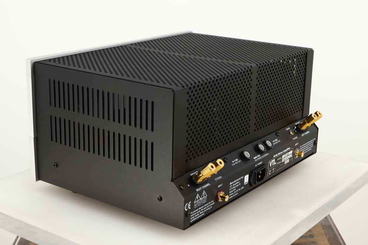 Rear right corner of a used VTL ST85 Power Amplifier in a silver finish 