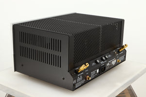 Rear right corner of a used VTL ST85 Power Amplifier in a silver finish 