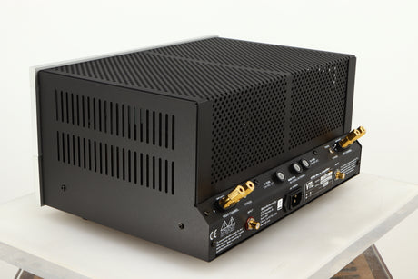 Rear right corner of a used VTL ST85 Power Amplifier in a silver finish 