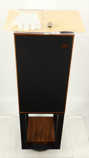 Top of a used Wharfedale Linton Standmount Speaker W/ Stand in a walnut finish showing 4x Gloves, 2x Manuals and 8x Floor Protectors