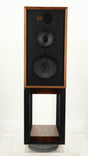 Front view of a used Wharfedale Linton Standmount Speaker W/ Stand in a walnut finish