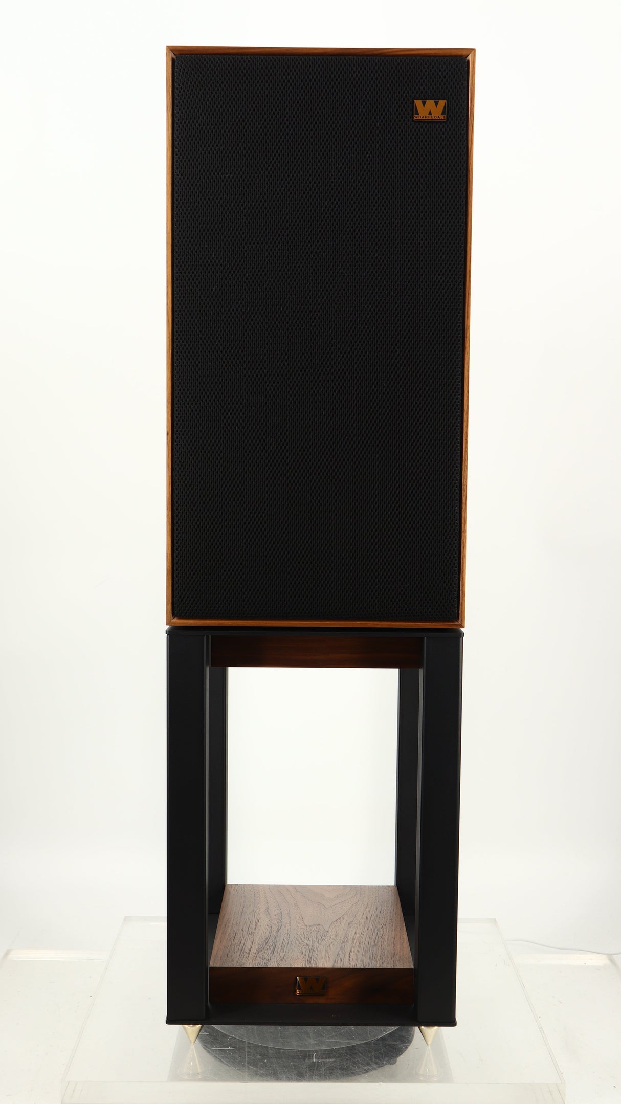 Front view of a used Wharfedale Linton Standmount Speaker W/ Stand in a walnut finish showing grille