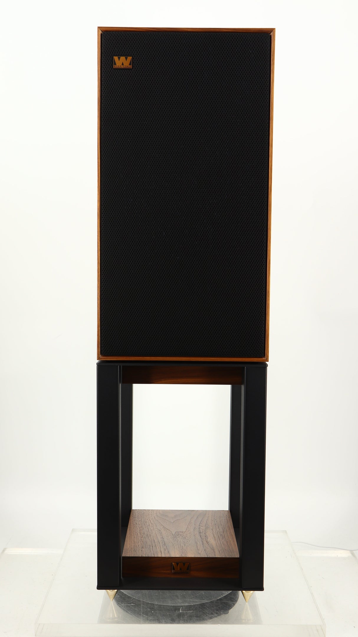 Front view of a used Wharfedale Linton Standmount Speaker W/ Stand in a walnut finish showing grille