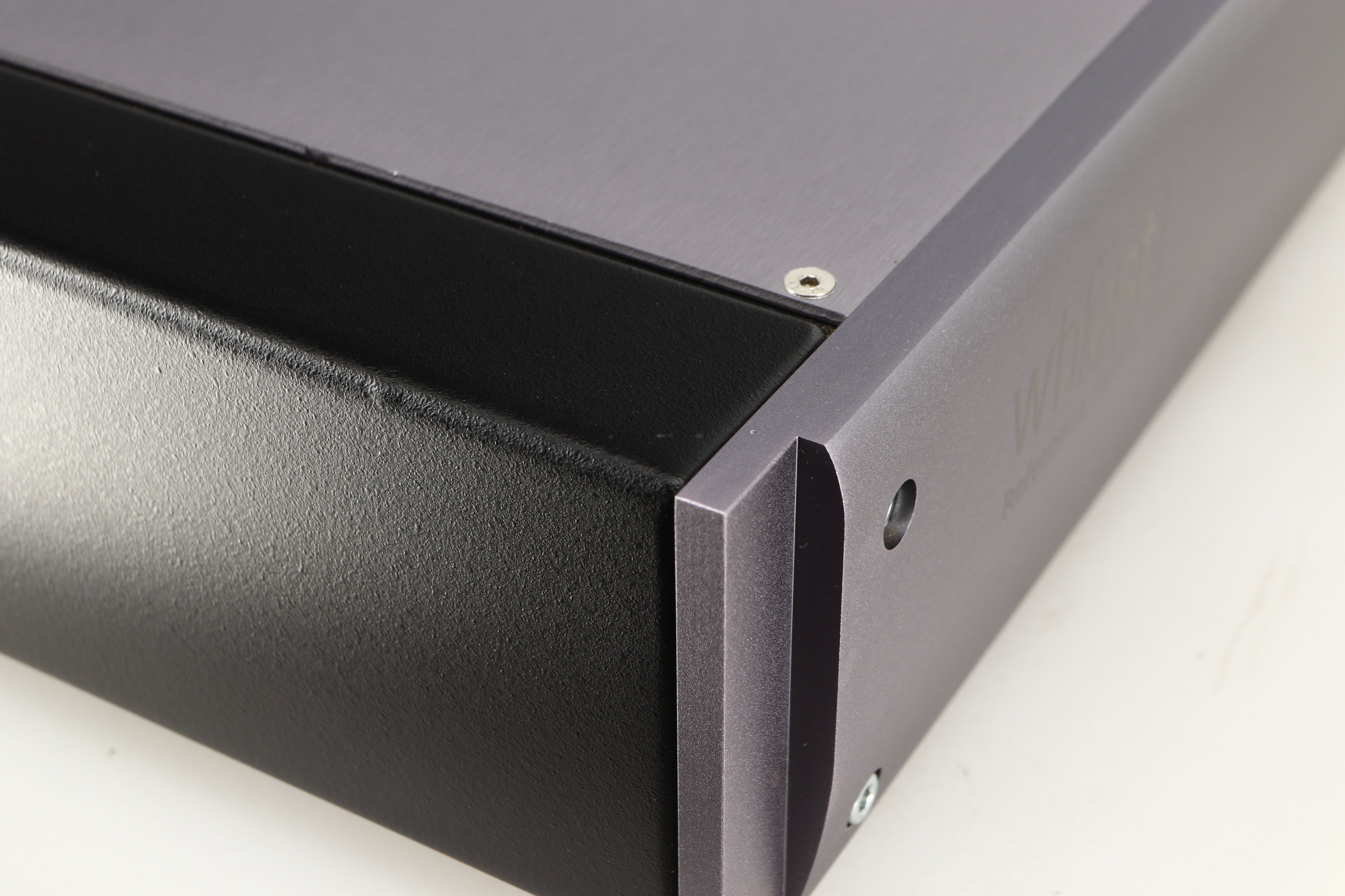 Close up of a used Whest PS.30R Phonostage showing small bump on left edge