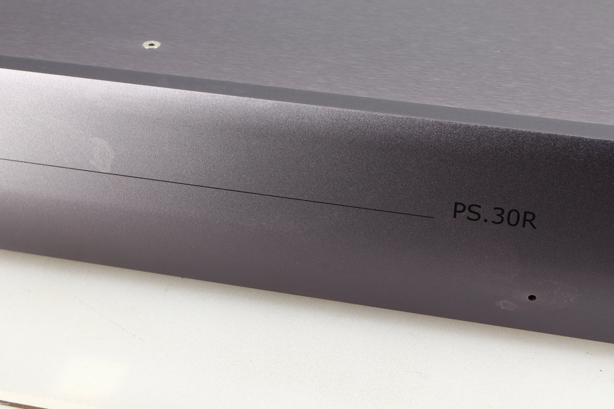 Close up of a used Whest PS.30R Phonostage showing markings on fascia