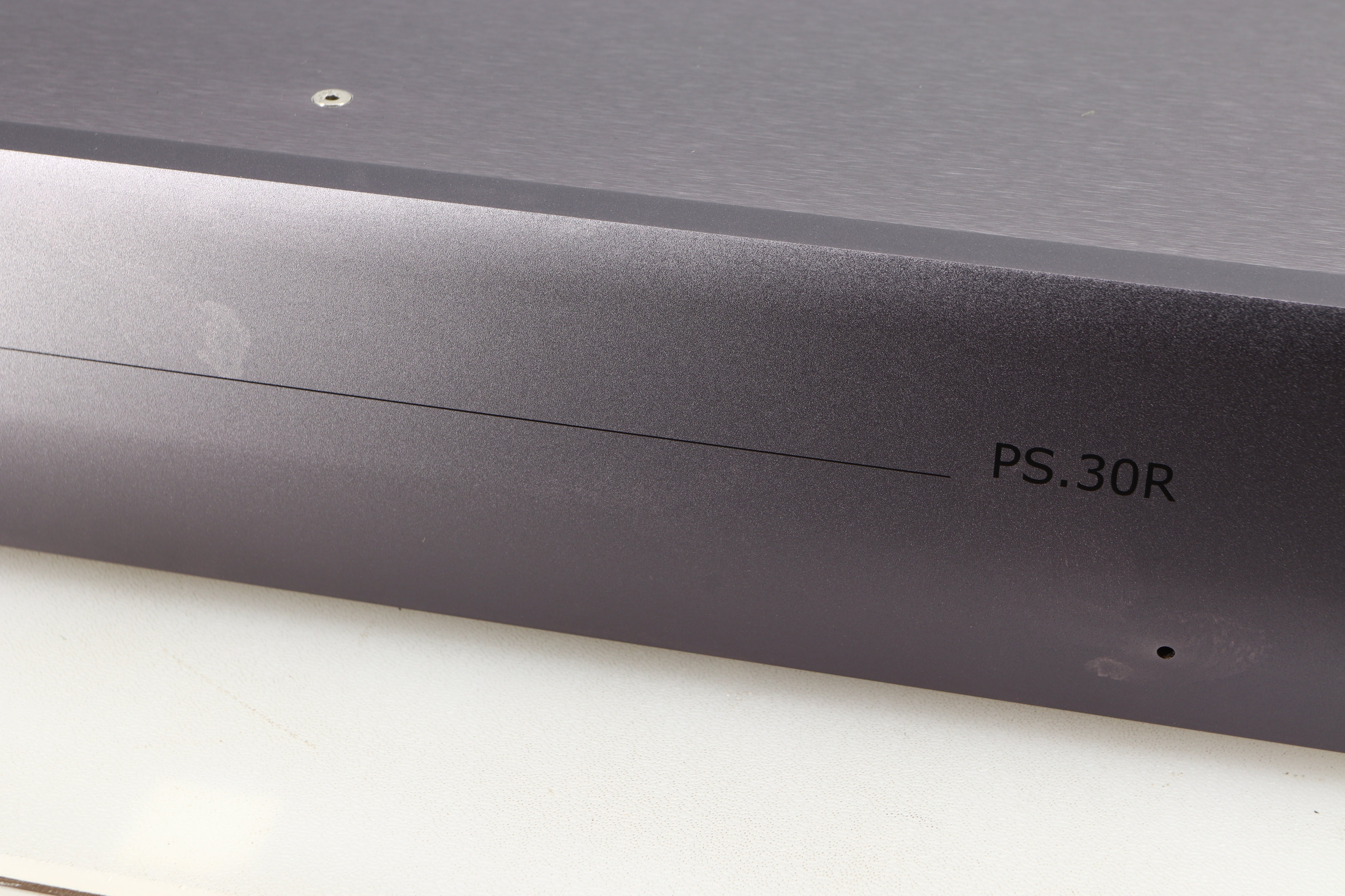 Close up of a used Whest PS.30R Phonostage showing markings on fascia