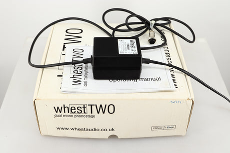 Box for a used Whest TWO MM/MC Phonostage showing Manual and Power Supply 