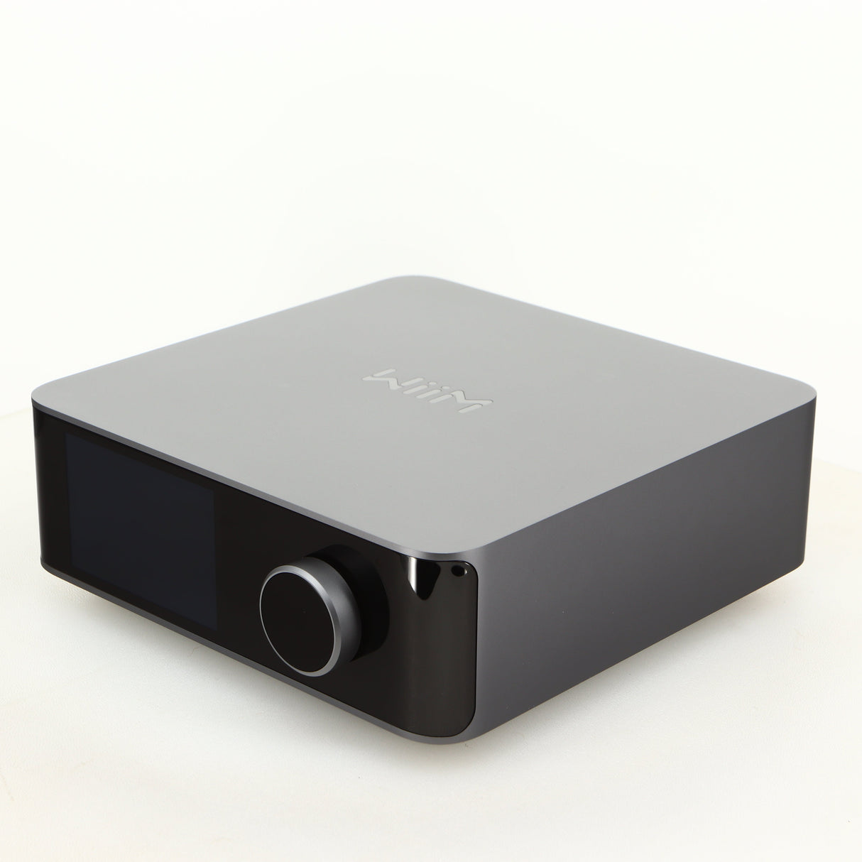 Front right corner of a used Wiim Amp Ultra Streaming Amplifier in a grey finish