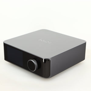 Front right corner of a used Wiim Amp Ultra Streaming Amplifier in a grey finish