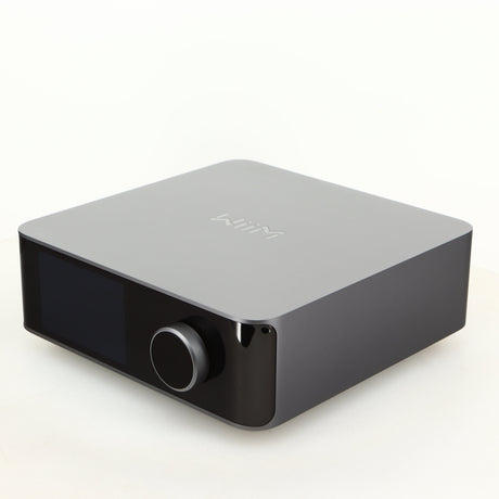 Front right corner of a used Wiim Amp Ultra Streaming Amplifier in a grey finish