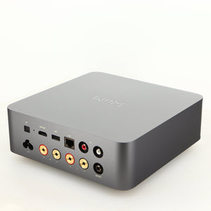 Rear left corner of a used Wiim Amp Ultra Streaming Amplifier in a grey finish