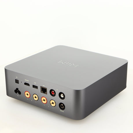 Rear left corner of a used Wiim Amp Ultra Streaming Amplifier in a grey finish