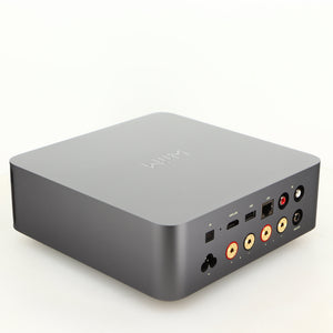 Rear right corner of a used Wiim Amp Ultra Streaming Amplifier in a grey finish