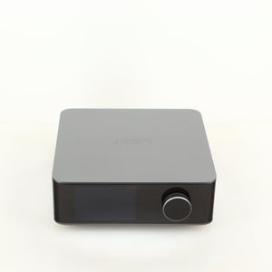 Top of a used Wiim Amp Ultra Streaming Amplifier in a grey finish