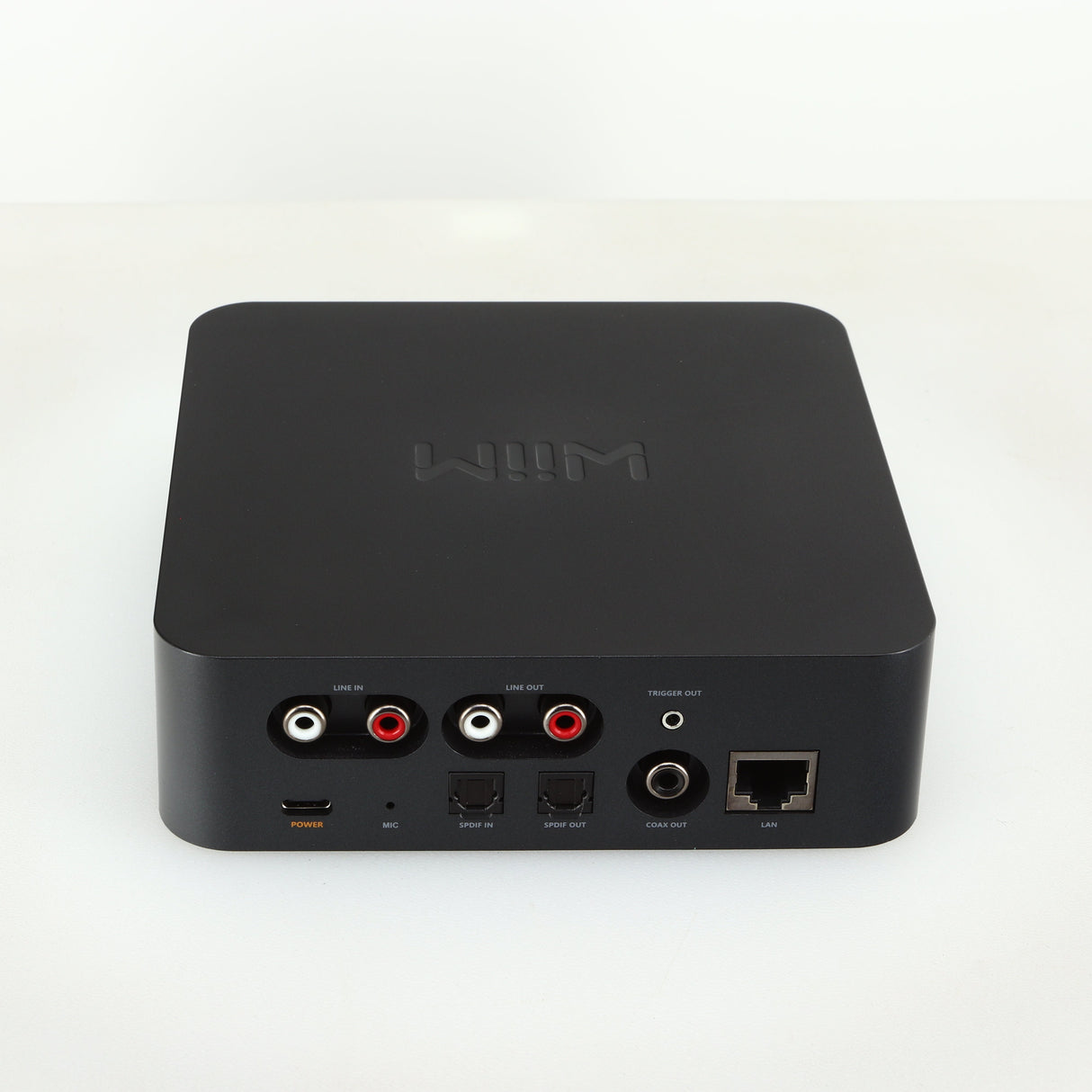 Rear view of a used Wiim Pro Plus Streamer in a black finish showing Phono Inputs, Optical Inputs and Output, Power Input and LAN Input