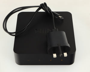 Top of a used WiiM Pro Streamer showing USB Cable