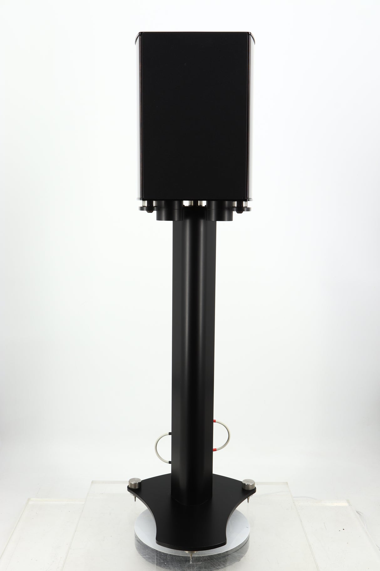 Front view of a used Wilson Benesch Vertex Standmount Speakers W/ Stands in a gloss walnut finish showing one of the grilles