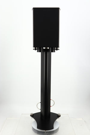 Front view of a used Wilson Benesch Vertex Standmount Speakers W/ Stands in a gloss walnut finish showing one of the grilles