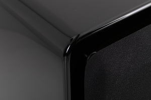 Front left corner of a used XTZ SA-1 Subwoofer in a Gloss Black finish