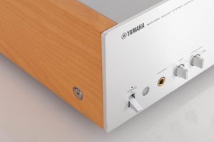 Front left corner of a used Yamaha A-S2000 Integrated Amplifier in a Silver finish