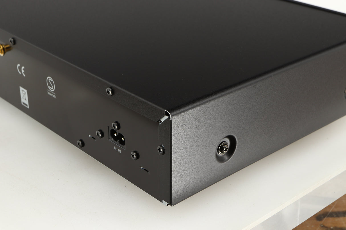 Rear left corner of a used Yamaha NP-S303 Musicast Streamer in a black finish